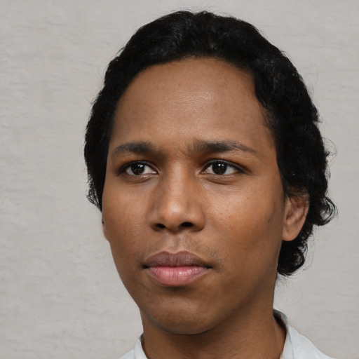 Neutral black young-adult female with short  black hair and brown eyes
