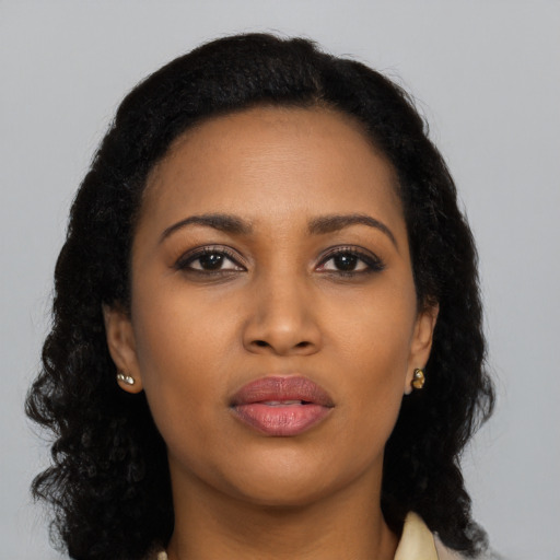 Neutral black young-adult female with long  black hair and brown eyes