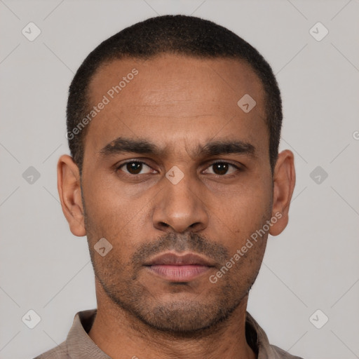 Neutral latino young-adult male with short  black hair and brown eyes