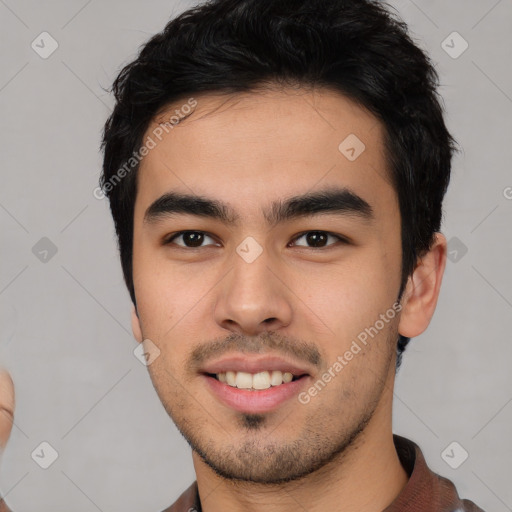 Joyful latino young-adult male with short  black hair and brown eyes