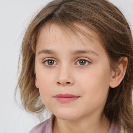 Joyful white child female with medium  brown hair and brown eyes