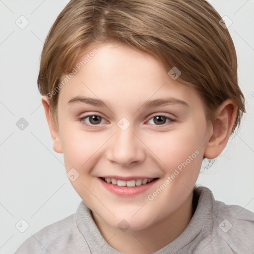 Joyful white child female with short  brown hair and brown eyes