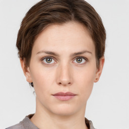 Neutral white young-adult female with short  brown hair and grey eyes