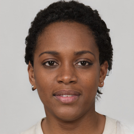 Neutral black young-adult female with short  black hair and brown eyes