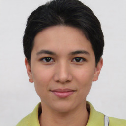 Joyful asian young-adult female with short  black hair and brown eyes