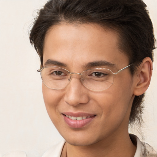 Joyful white young-adult male with medium  brown hair and brown eyes