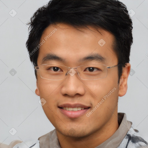 Joyful asian young-adult male with short  brown hair and brown eyes