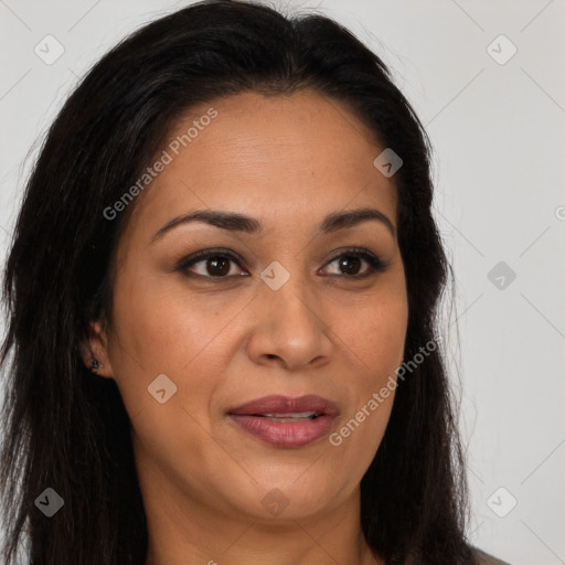 Joyful latino young-adult female with long  brown hair and brown eyes