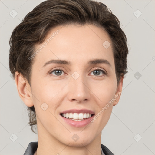 Joyful white young-adult female with short  brown hair and grey eyes