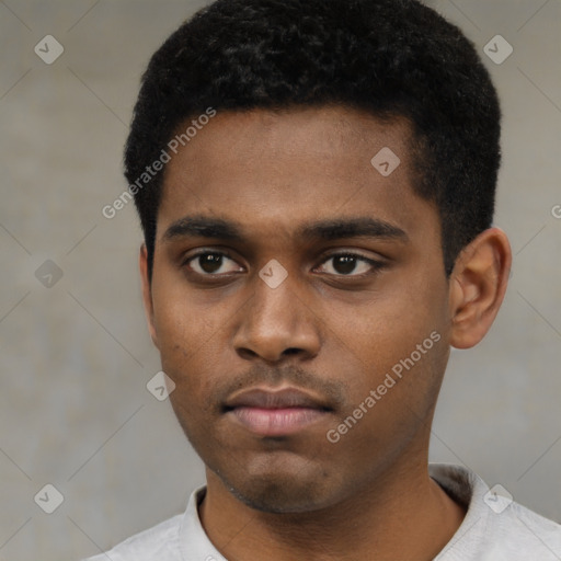 Neutral latino young-adult male with short  black hair and brown eyes