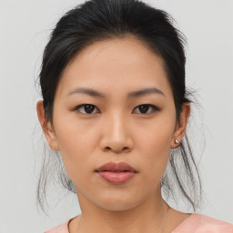 Neutral asian young-adult female with medium  brown hair and brown eyes