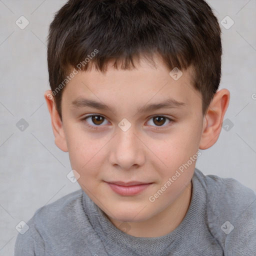 Joyful white child male with short  brown hair and brown eyes