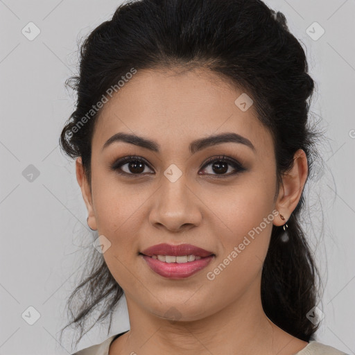 Joyful latino young-adult female with medium  brown hair and brown eyes