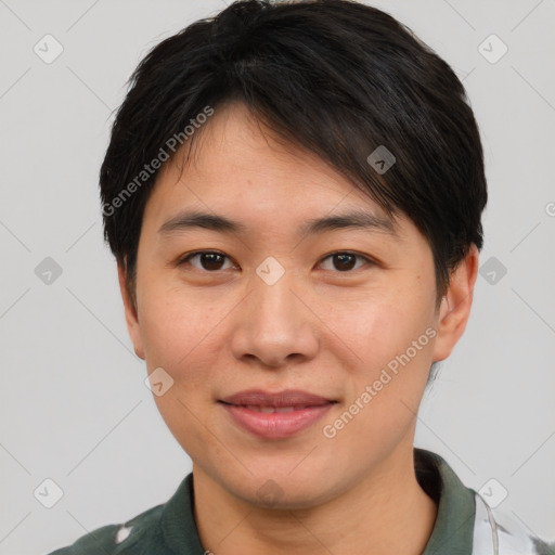 Joyful asian young-adult female with short  brown hair and brown eyes