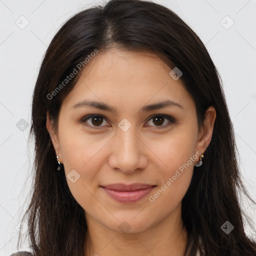 Joyful latino young-adult female with long  brown hair and brown eyes