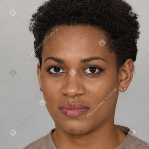 Joyful black young-adult female with short  brown hair and brown eyes