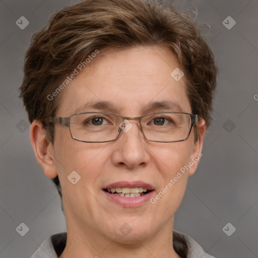 Joyful white adult female with short  brown hair and grey eyes