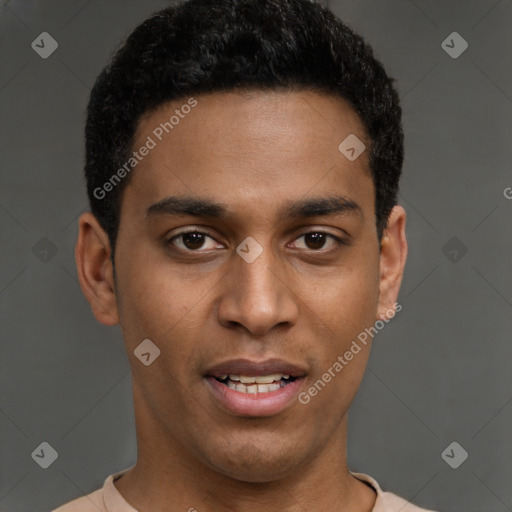 Joyful latino young-adult male with short  brown hair and brown eyes