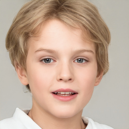 Joyful white child female with short  brown hair and blue eyes