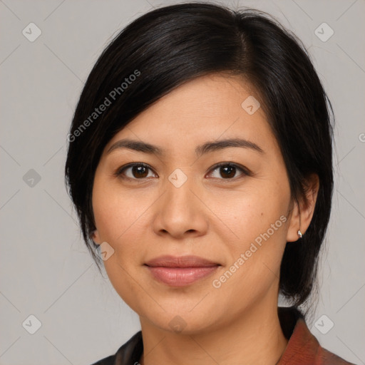 Joyful asian young-adult female with medium  black hair and brown eyes