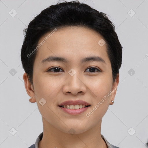 Joyful asian young-adult female with short  black hair and brown eyes