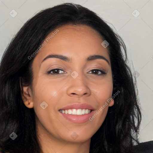 Joyful latino young-adult female with long  brown hair and brown eyes