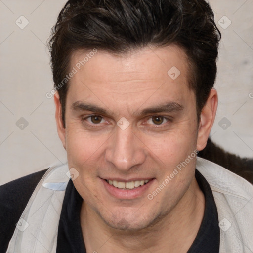 Joyful white adult male with short  brown hair and brown eyes