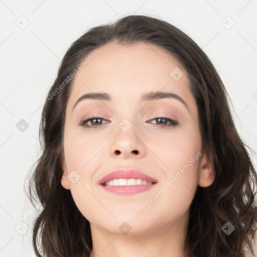 Joyful asian young-adult female with long  brown hair and brown eyes