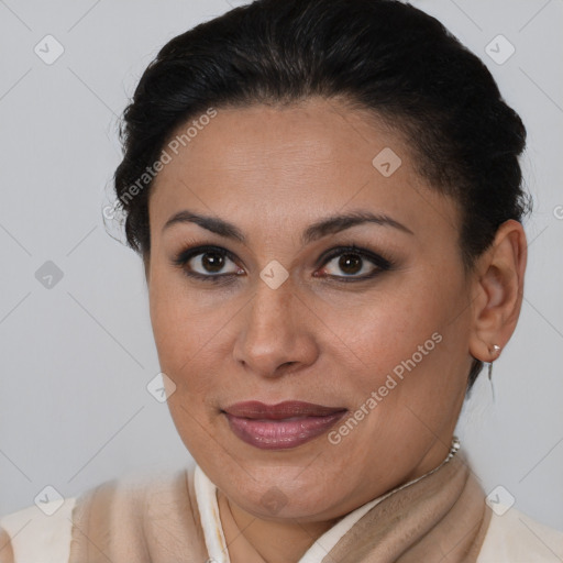 Joyful latino young-adult female with short  brown hair and brown eyes