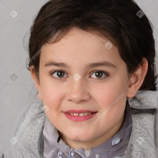 Joyful white child female with short  brown hair and brown eyes