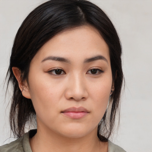 Neutral white young-adult female with medium  brown hair and brown eyes