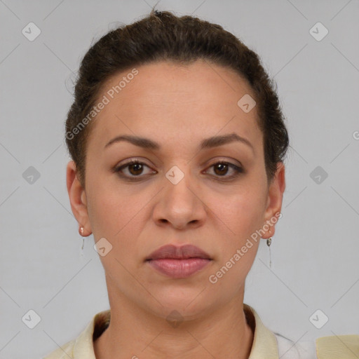 Joyful latino young-adult female with short  brown hair and brown eyes