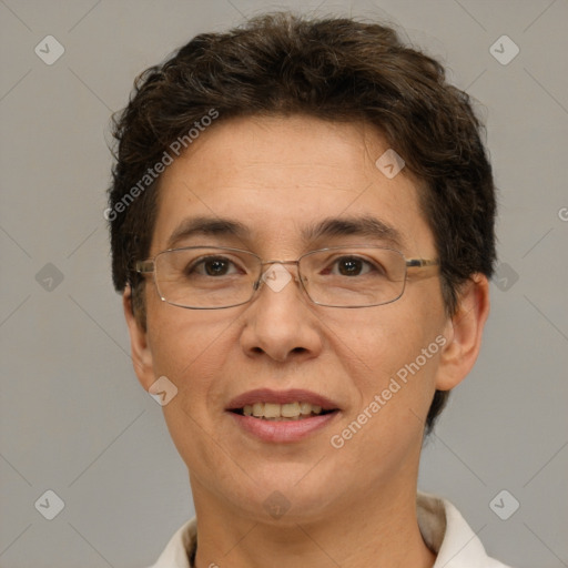 Joyful white adult female with short  brown hair and brown eyes