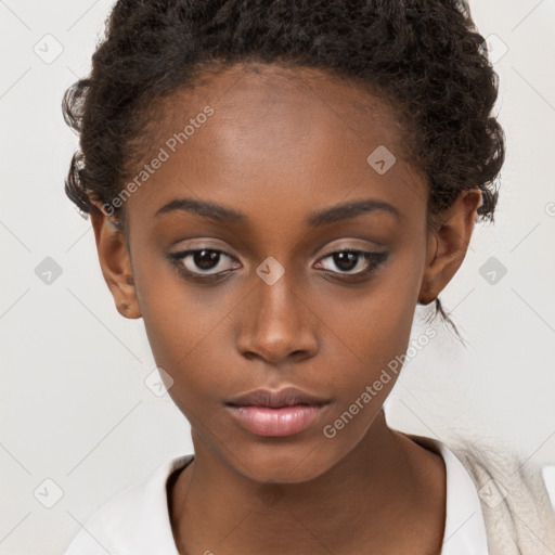 Neutral black young-adult female with short  brown hair and brown eyes