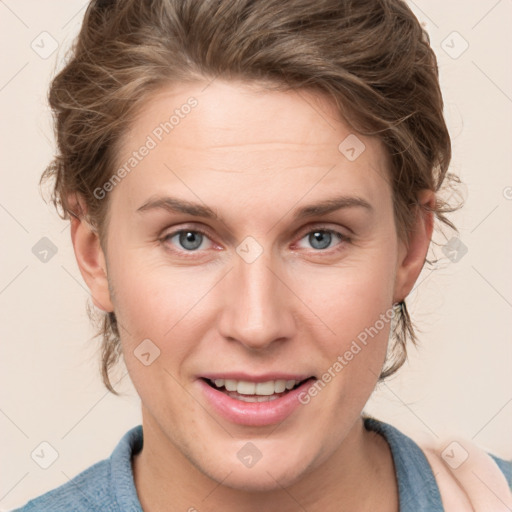 Joyful white young-adult female with medium  brown hair and blue eyes