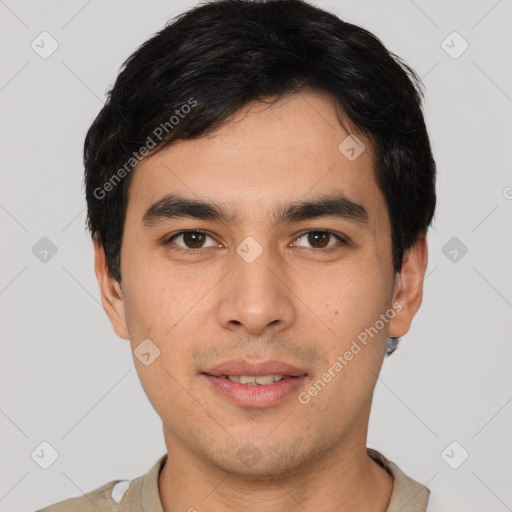 Joyful white young-adult male with short  black hair and brown eyes