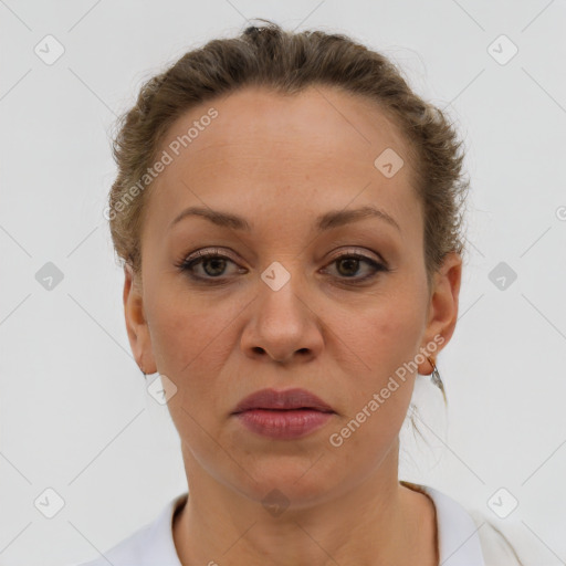 Joyful white adult female with short  brown hair and brown eyes