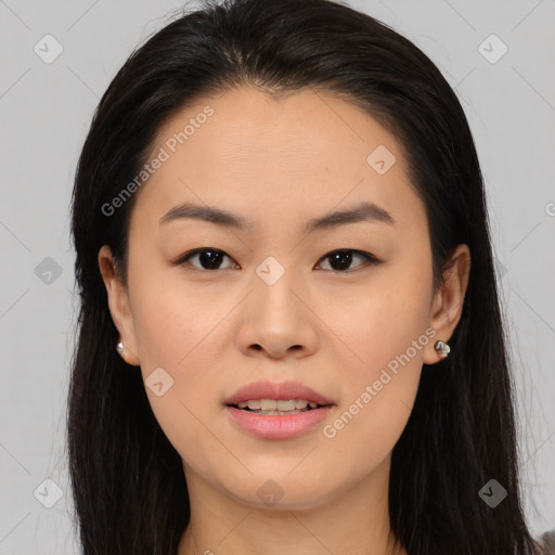 Joyful asian young-adult female with long  brown hair and brown eyes