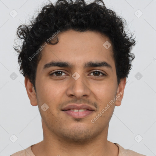 Joyful latino young-adult male with short  brown hair and brown eyes