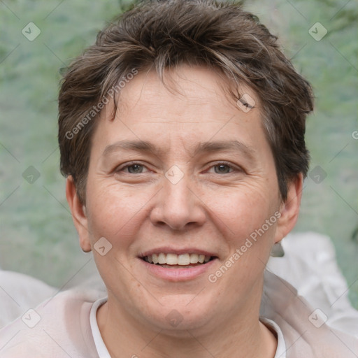 Joyful white adult female with short  brown hair and brown eyes