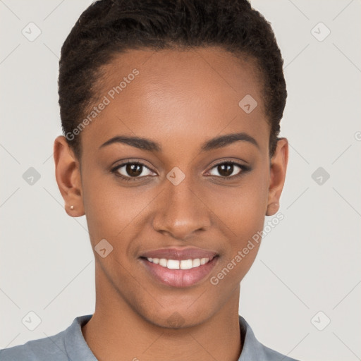 Joyful black young-adult female with short  brown hair and brown eyes