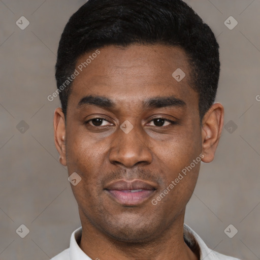 Joyful latino young-adult male with short  black hair and brown eyes