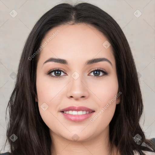 Joyful white young-adult female with long  black hair and brown eyes