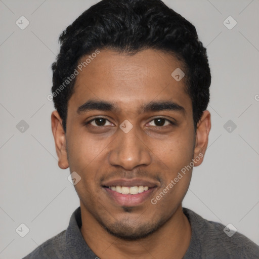 Joyful latino young-adult male with short  black hair and brown eyes