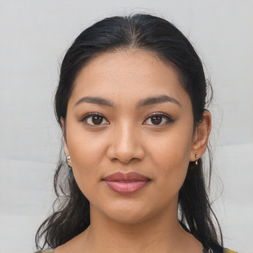 Joyful asian young-adult female with medium  brown hair and brown eyes