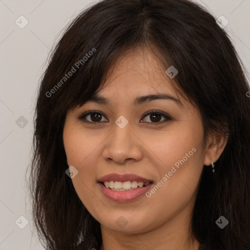 Joyful white young-adult female with long  brown hair and brown eyes