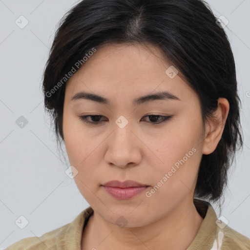 Joyful asian young-adult female with medium  brown hair and brown eyes