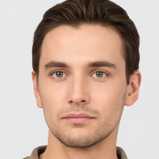 Neutral white young-adult male with short  brown hair and brown eyes