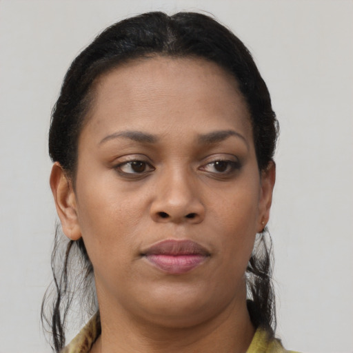 Neutral black young-adult female with long  black hair and brown eyes