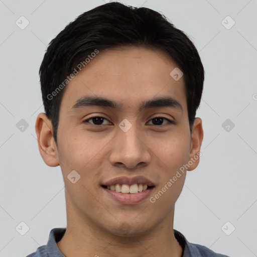 Joyful asian young-adult male with short  black hair and brown eyes